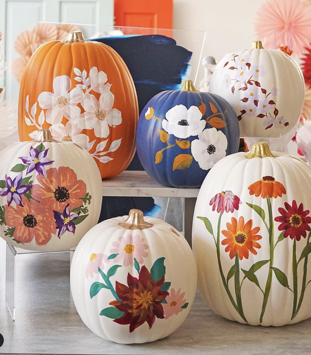 painted pumpkins with floral designs