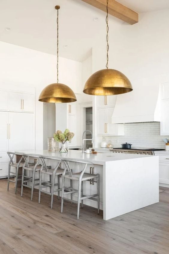 Discover inspiring kitchen island pendant lighting ideas in this blog post. From elegant singles to statement trios and more, find the perfect lighting to elevate your kitchen's style and functionality.